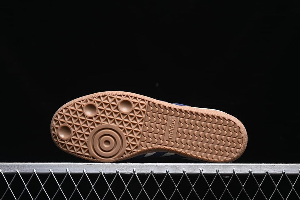 Underside of the gum-colored outsole with its patterned tread.