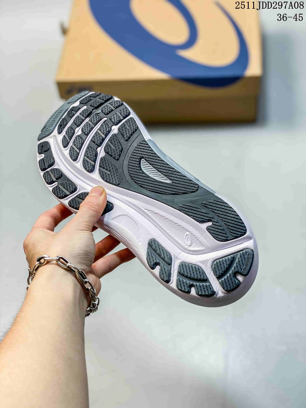 View of the dark outsole with segmented tread and white midsole.