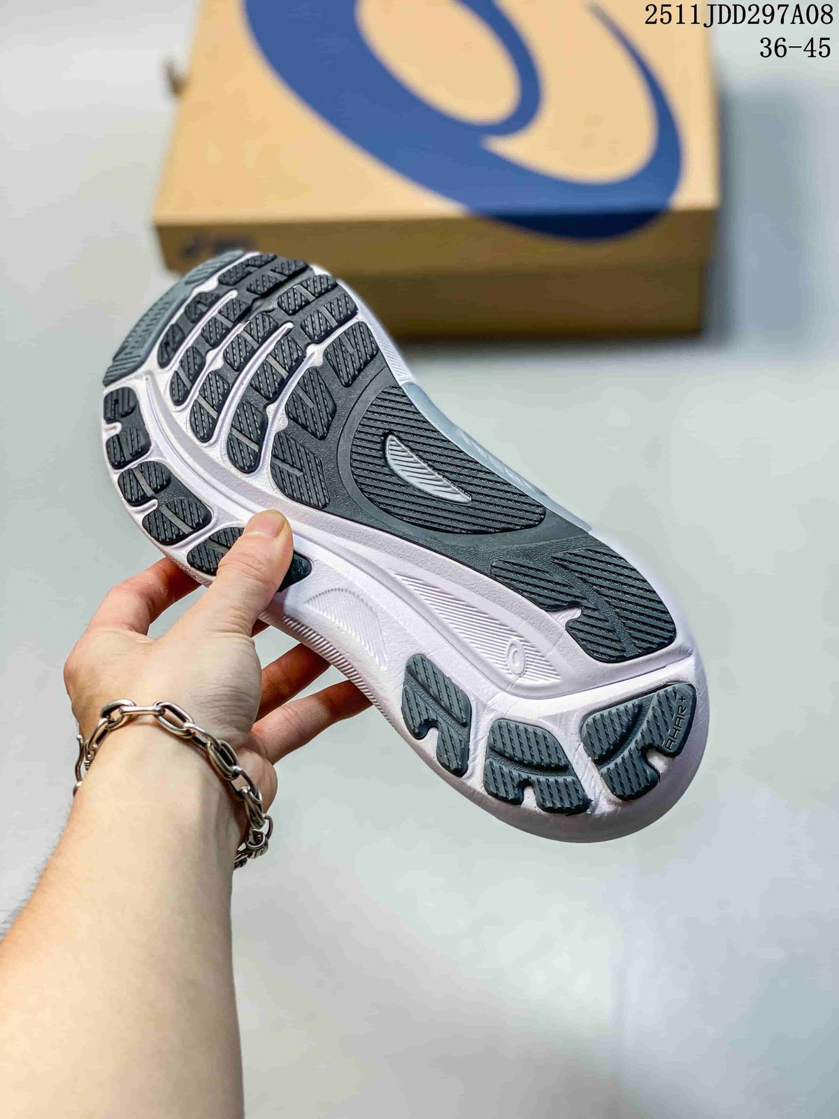 View of the dark outsole with segmented tread and white midsole.