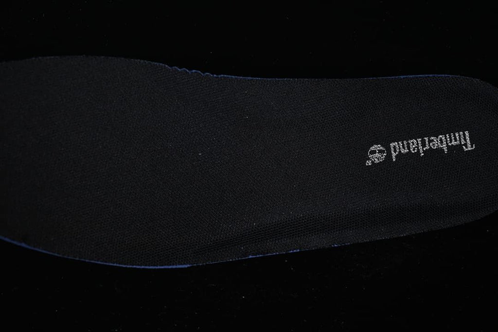 Close-up of a black insole with Timberland branding