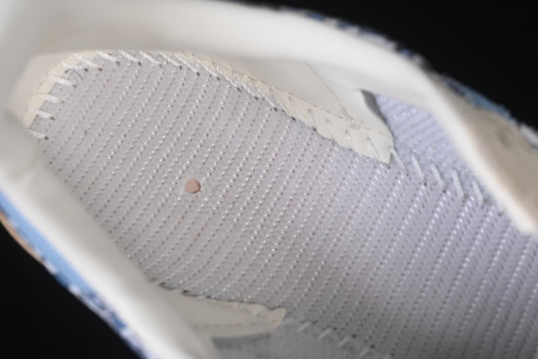 Close-up of the sneaker’s perforated insole and interior