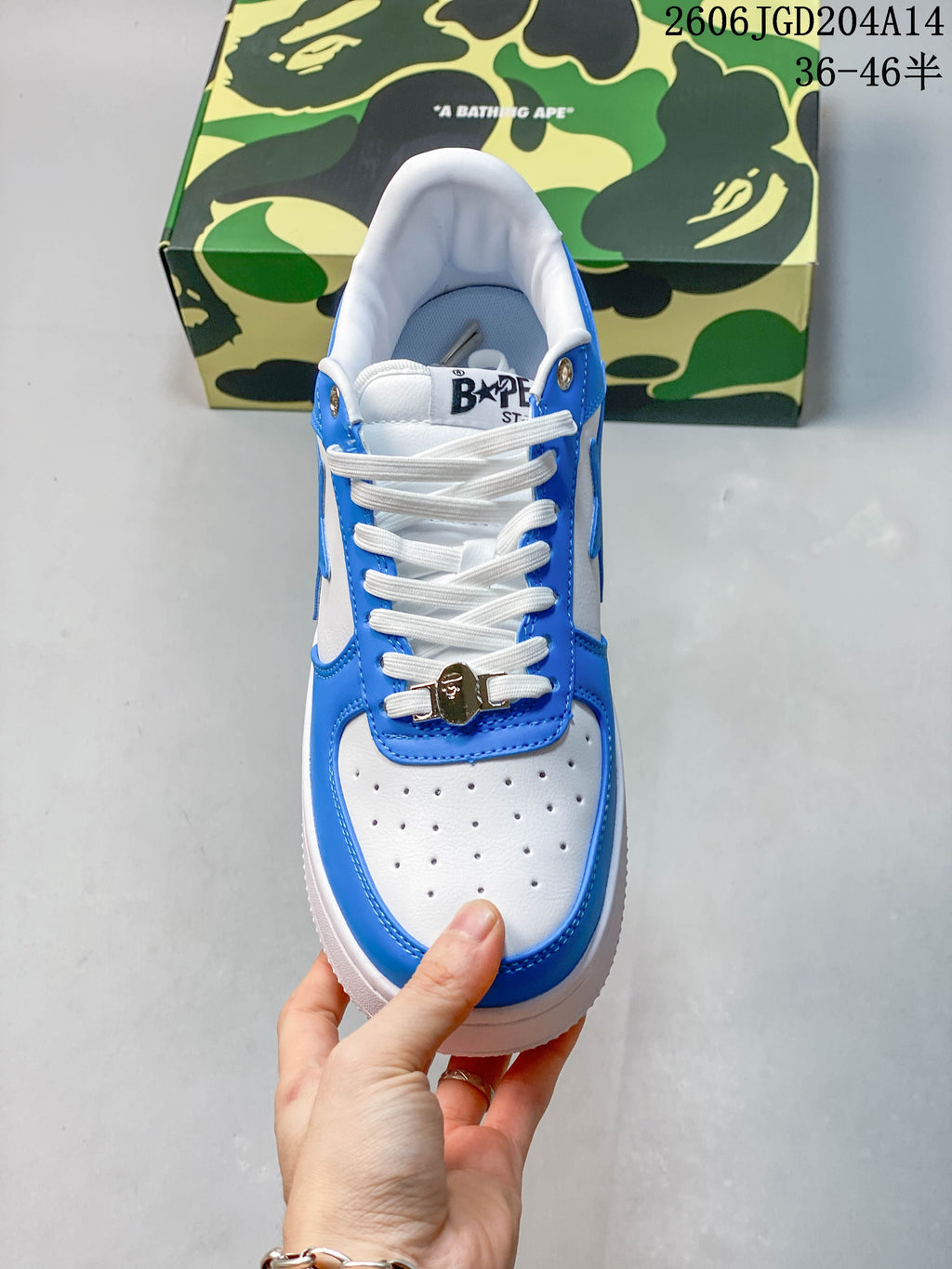 Top view of the sneaker showing laces and perforated toe panel