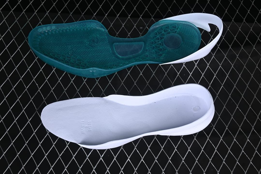 Teal outsole and white insole shown separately