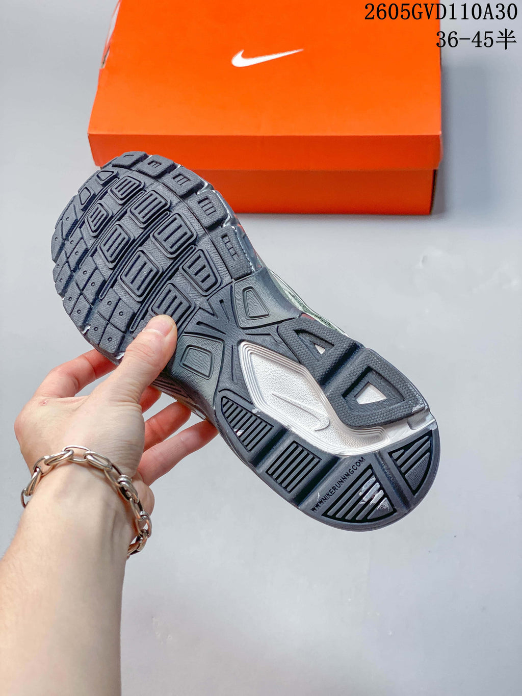 Close-up of the patterned outsole on a Nike Initiator sneaker