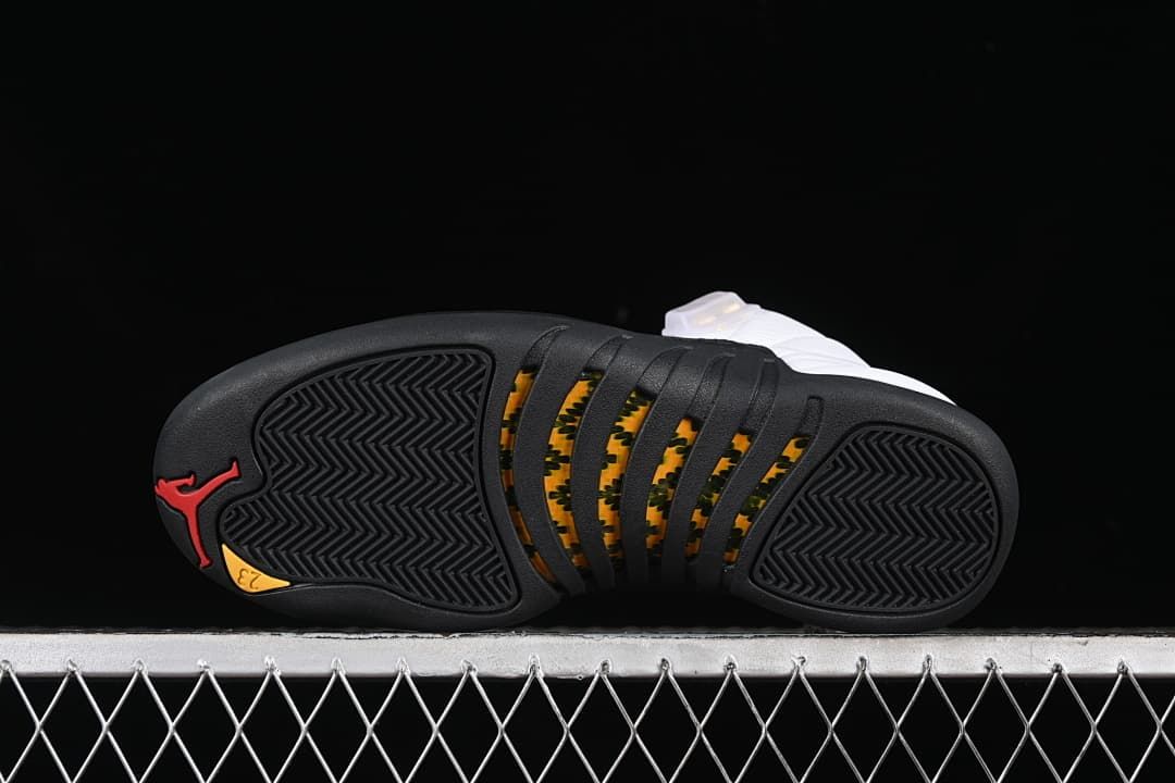 Underside view showing the black outsole, patterned central sections, and red Jumpman logo.