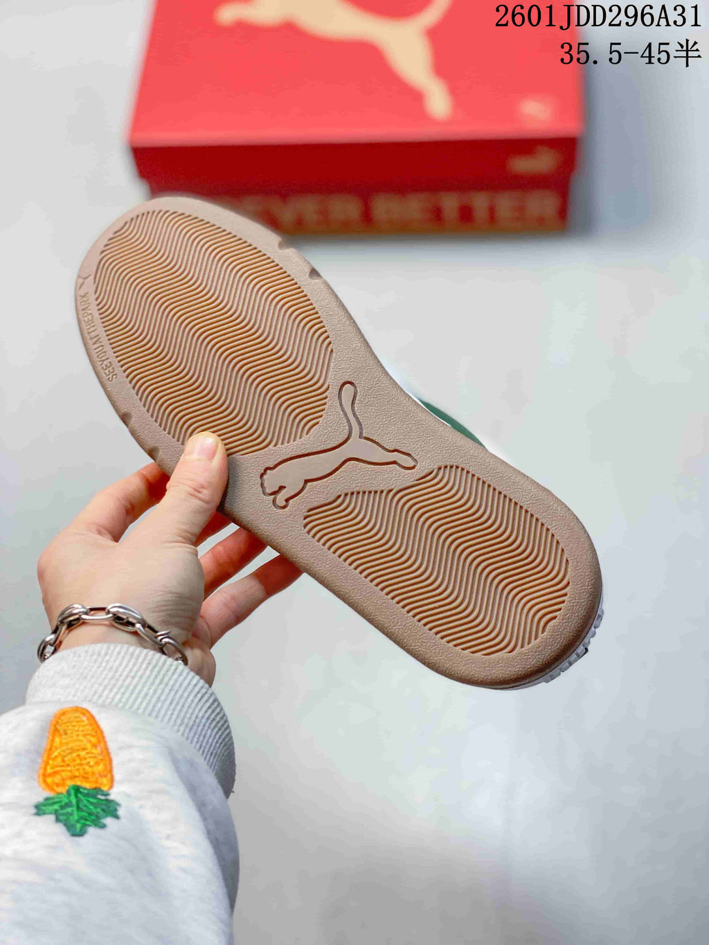 Gum-tone outsole with molded PUMA logo and textured tread