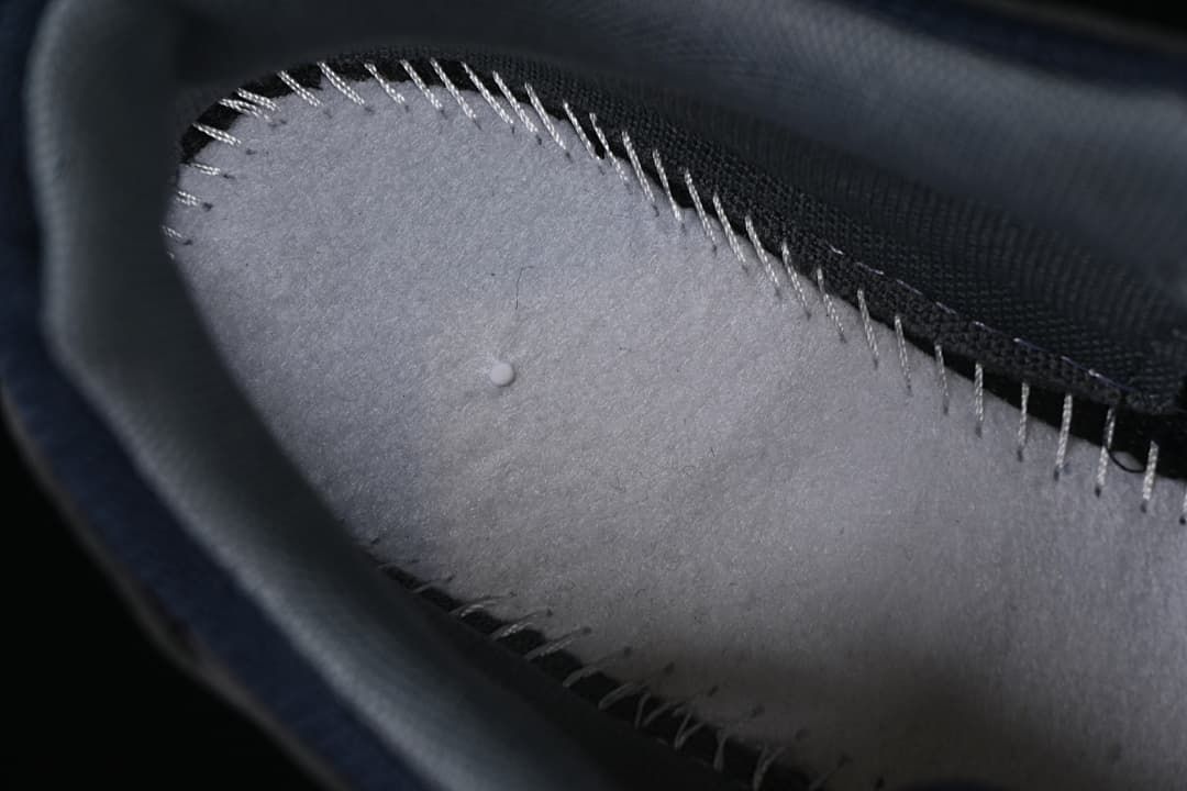 Close-up of the interior stitching and lining.