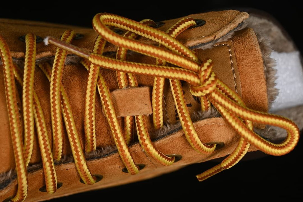 Close-up of the lace-up front and plush lining.