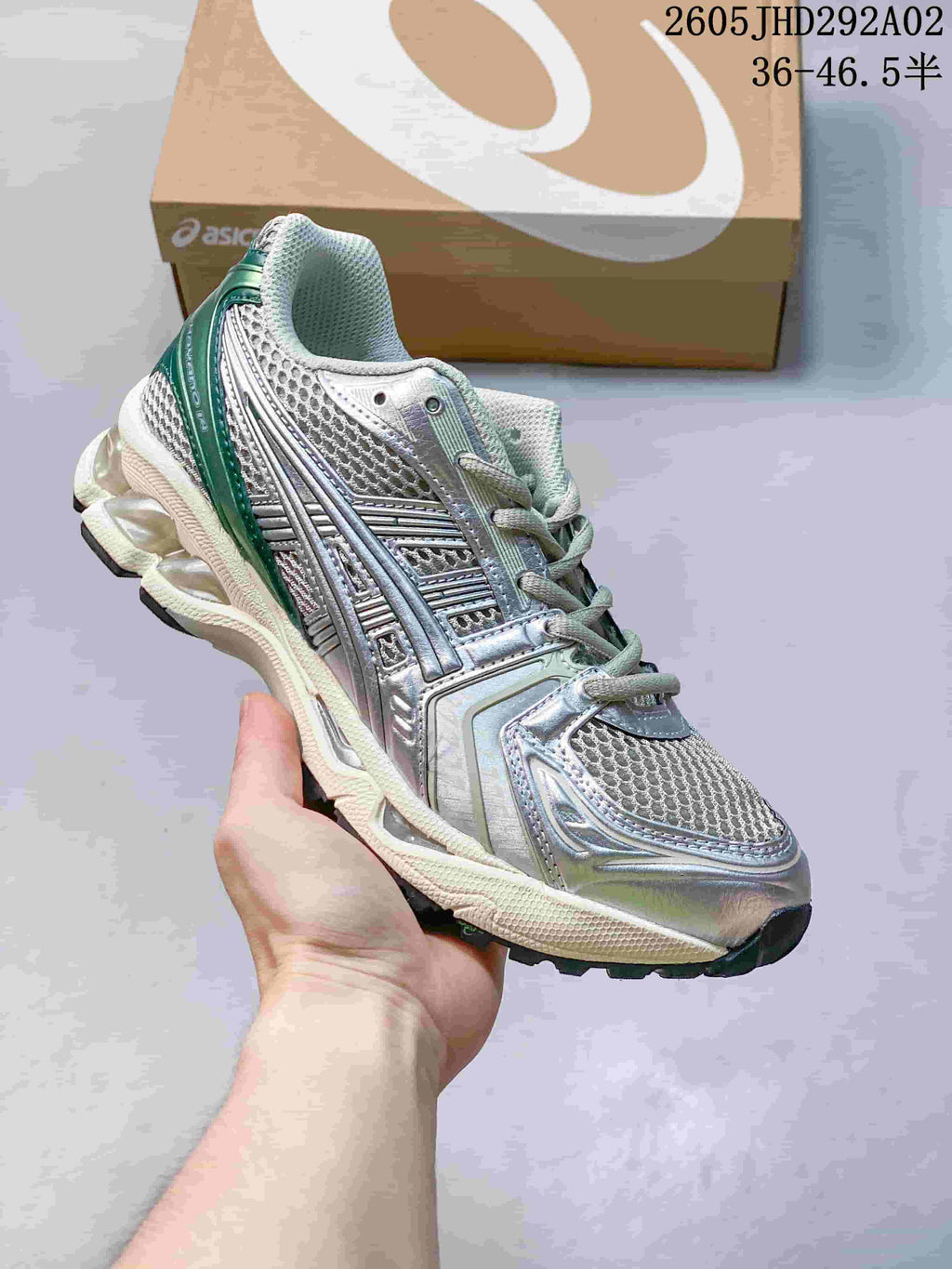 ASICS GEL-KAYANO 14 sneaker in silver and gray with green accents