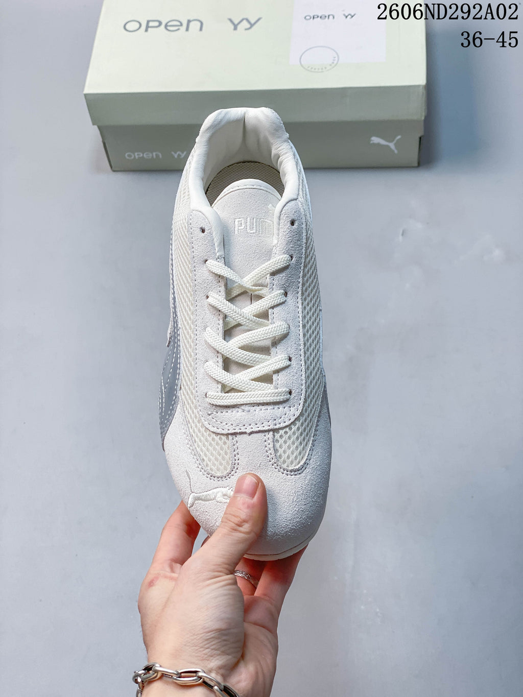 Top view of a Puma Speedcat sneaker showing the laces and mesh-look panels.