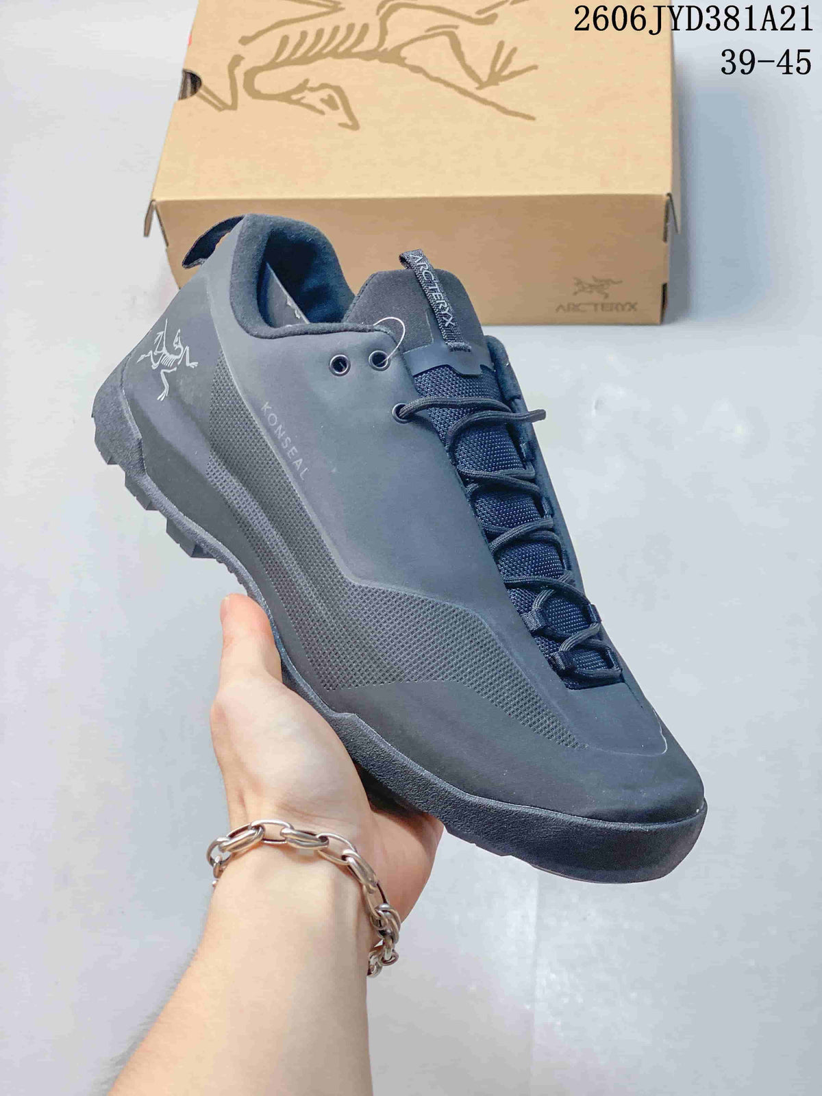 Dark gray Arc'teryx Konseal shoe shown from the side