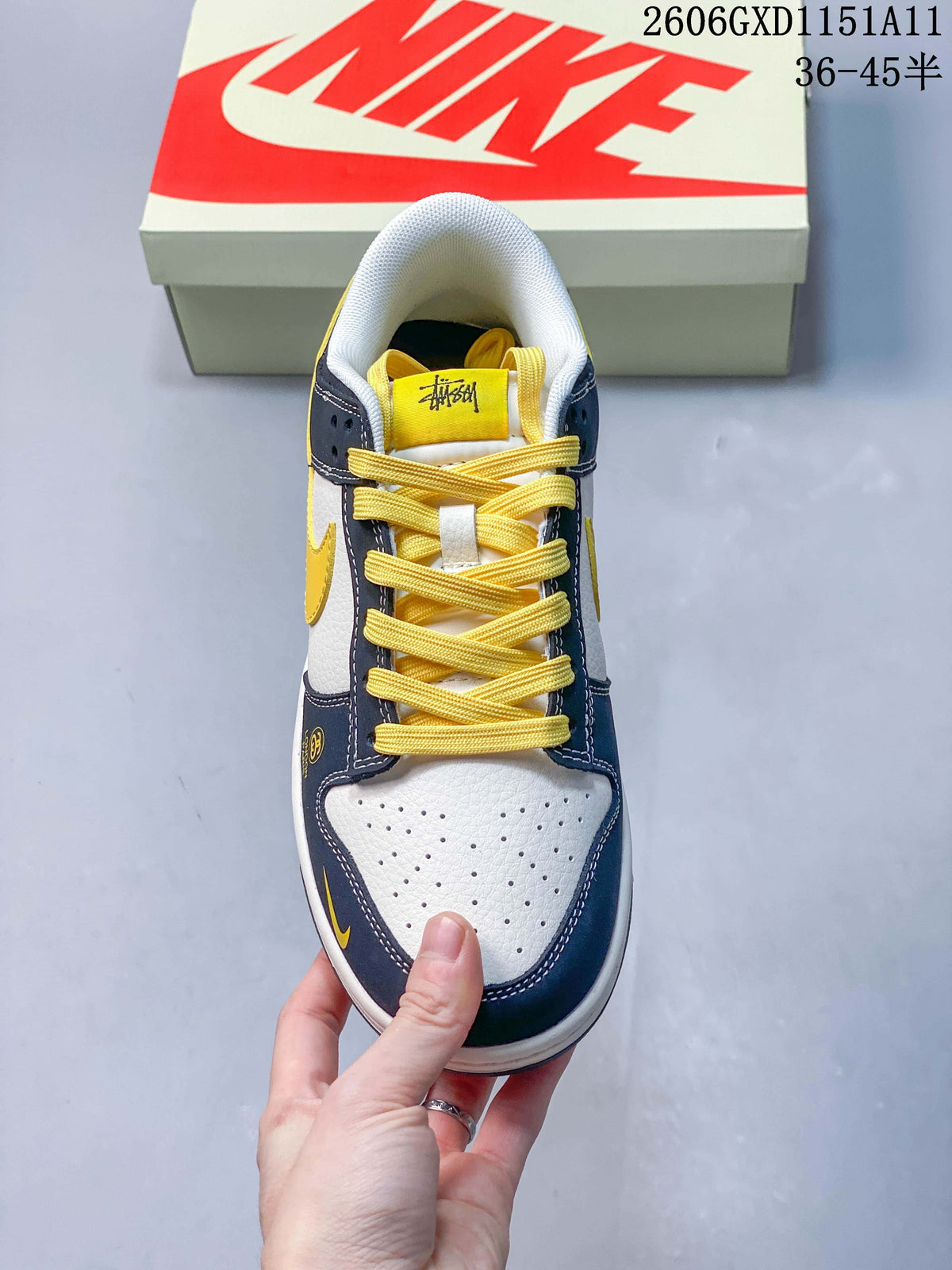 Top view showing perforated toe, yellow laces and tongue label