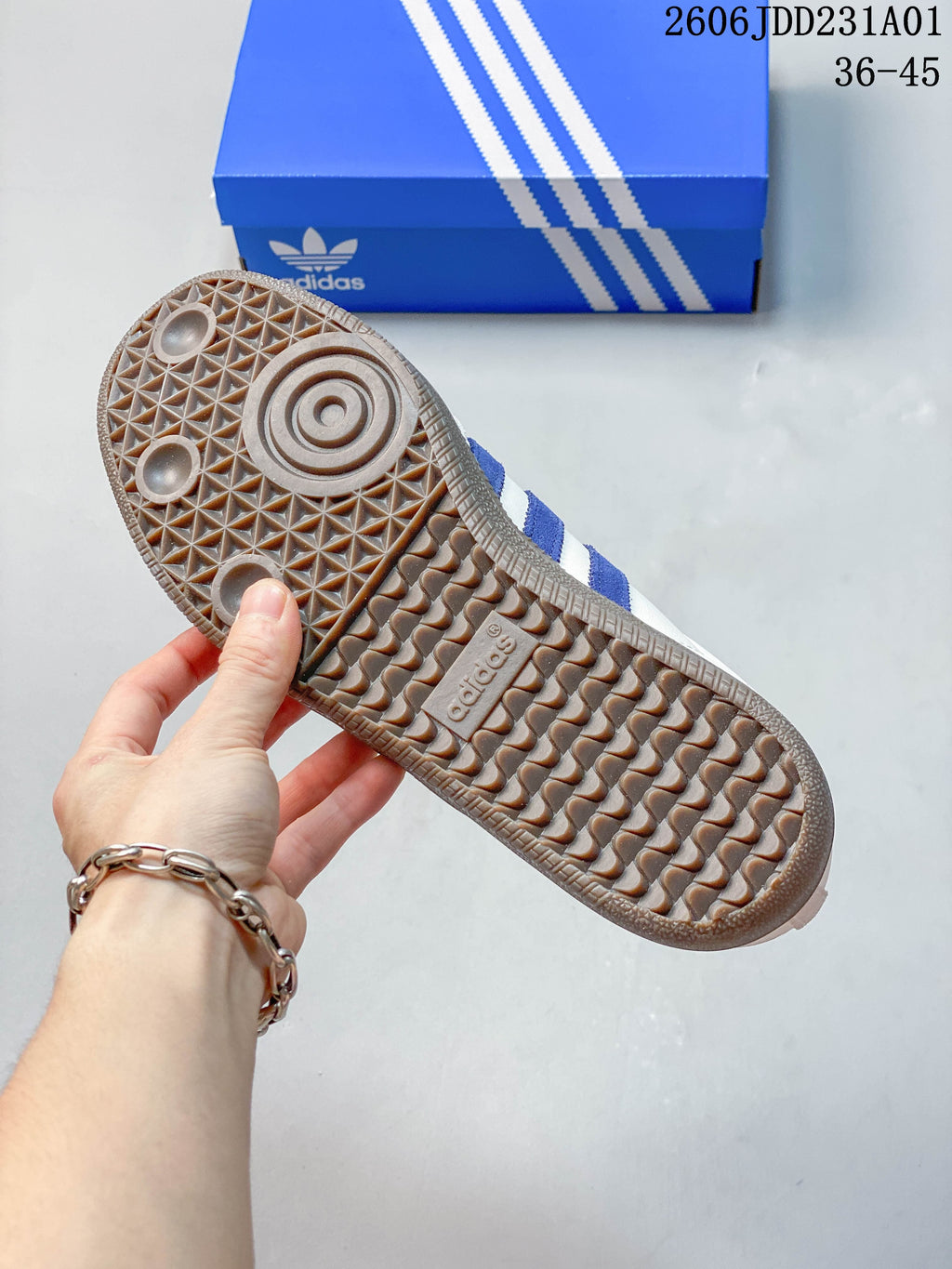 Underside of the Samba OG sneaker showing its gum-colored patterned outsole