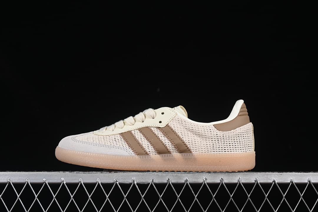 Side view of a beige and brown adidas Samba OG sneaker