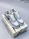 Pair of off-white and light-blue low-top sneakers with dark Swoosh panels, photographed on a shoe box; image overlay shows code 2606ND1198A08 and size range 36–45.5.