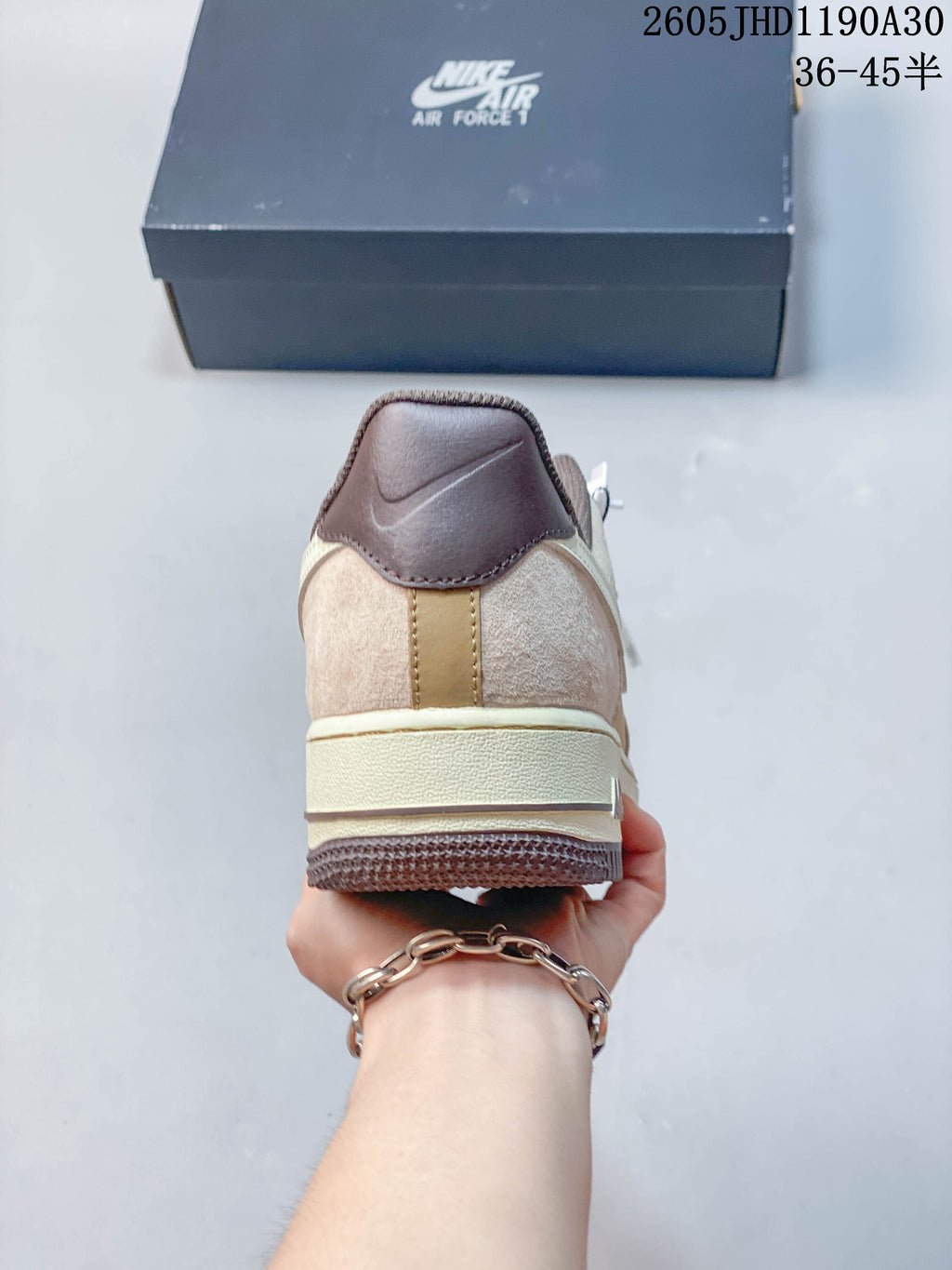 Rear view of the Nike Air Force 1 sneaker with a contrasting heel panel