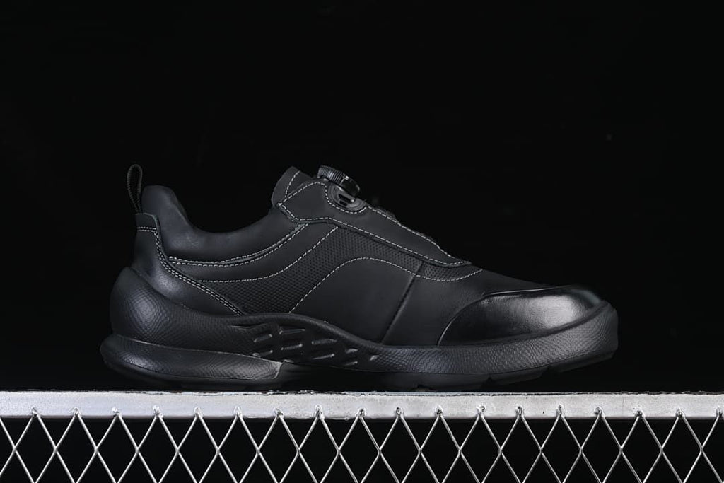 Side profile showing the black upper and sculpted sole