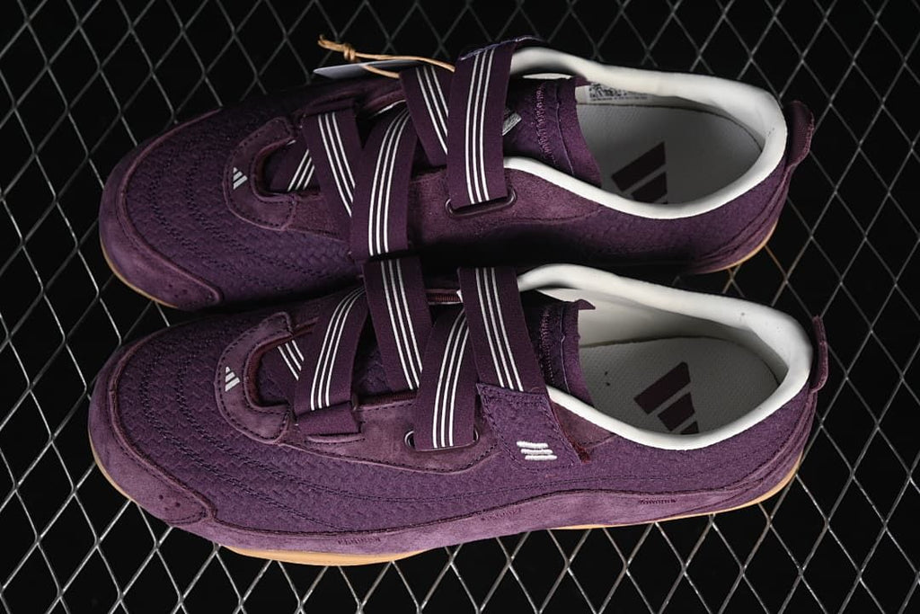 Pair of purple adidas Urban Reverie sneakers with striped hook-and-loop straps