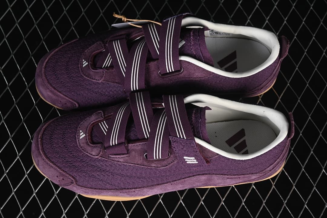 Pair of purple adidas Urban Reverie sneakers with striped hook-and-loop straps