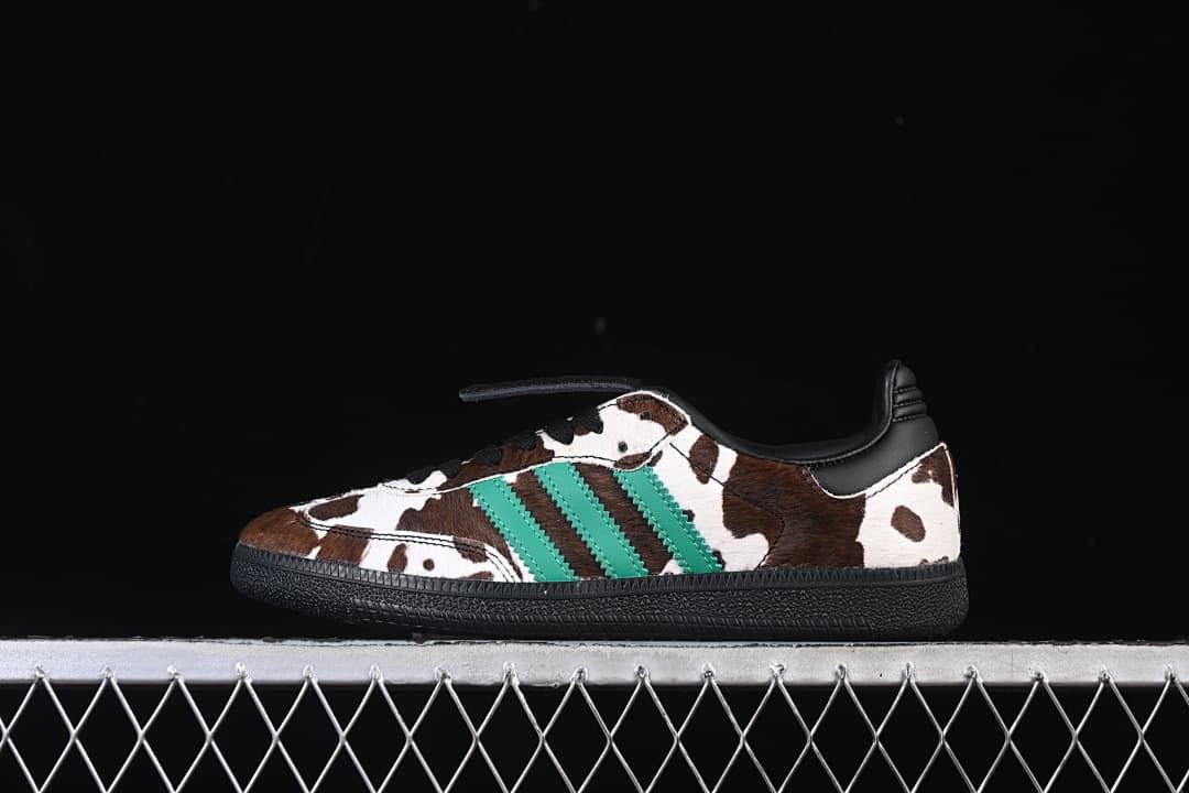 Side view of adidas Samba LT JS3930 sneakers with brown-and-white cow print, green stripes and black sole