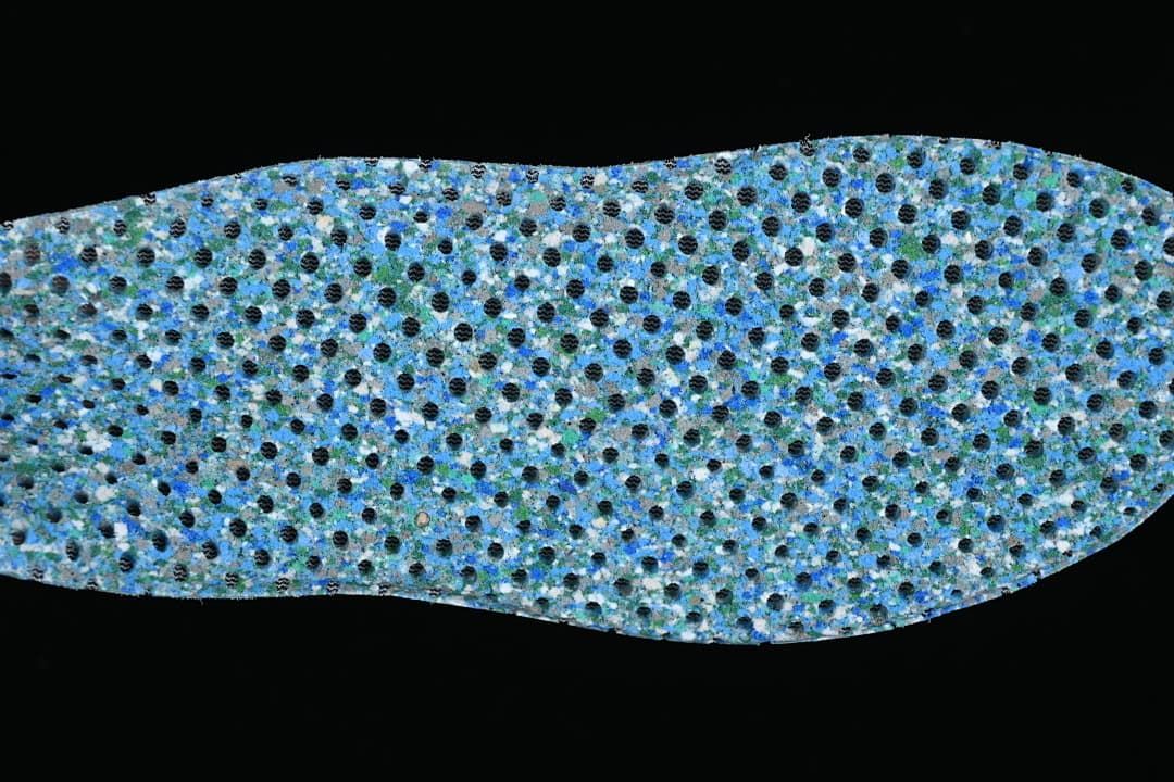 Close-up of the blue, white, and black patterned insole surface