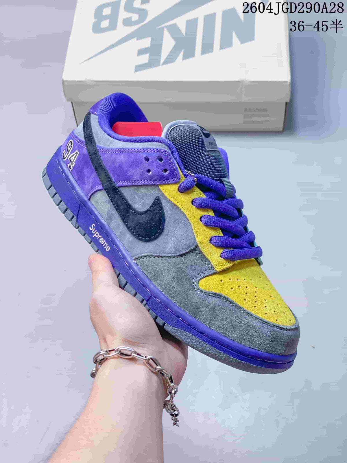 Purple, gray, yellow, and dark-accent low-top sneaker