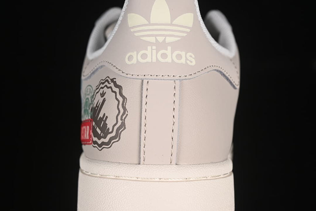 Rear view showing adidas branding on the heel and graphic side detail.