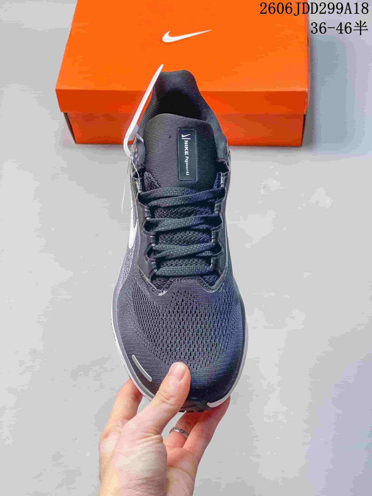 Top view of a dark gray Nike Pegasus 41 running shoe with laces