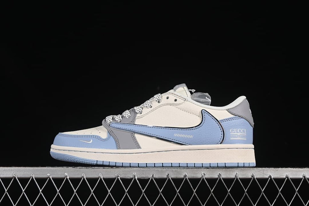 Side view of a grey and blue low-top sneaker with a pale midsole