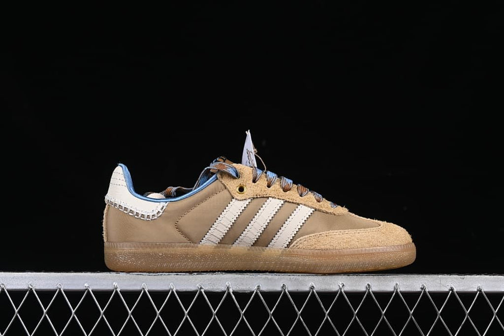 Side profile highlighting the three stripes and low-profile outsole