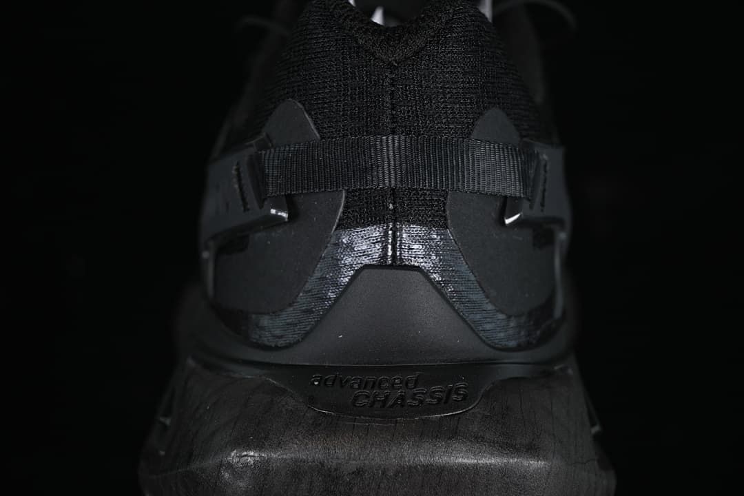 Rear view highlighting the heel structure and branding.