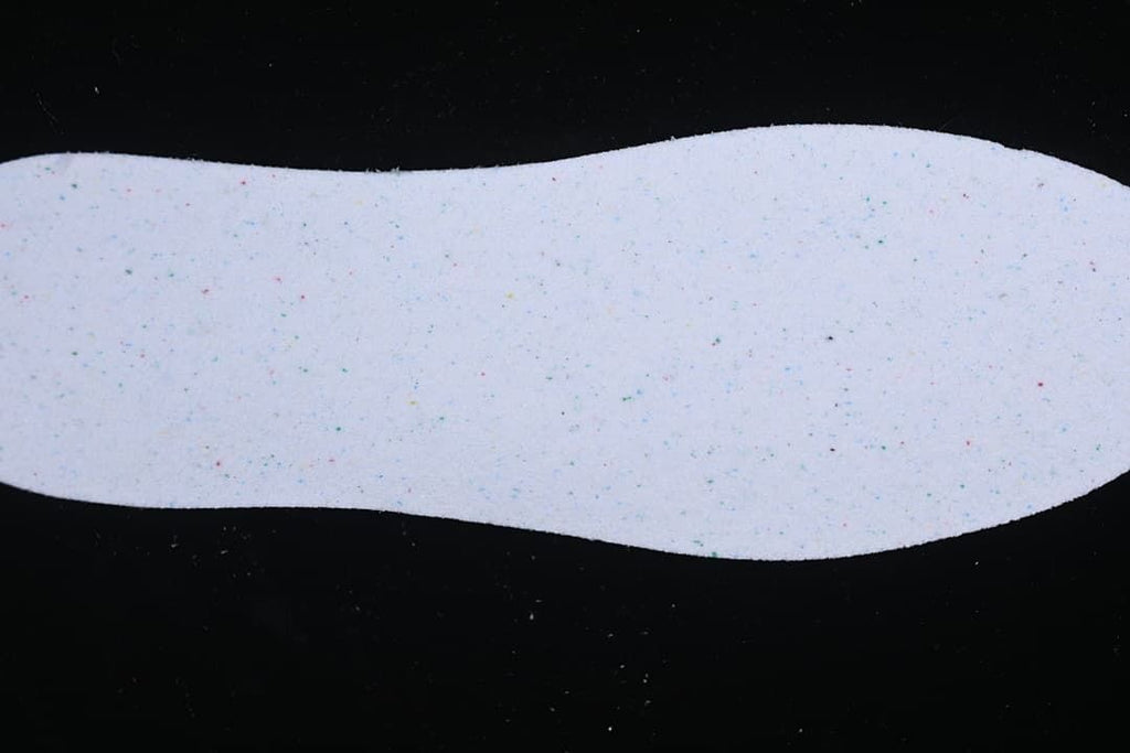 Light-colored shoe insole shown from above.