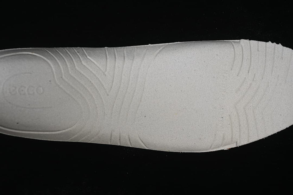 Close-up of the light-colored outsole surface