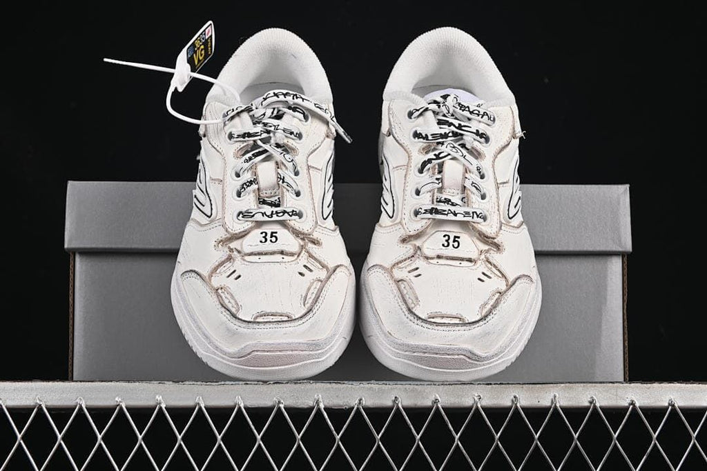 Front view of the pair with patterned laces and size 35 markings