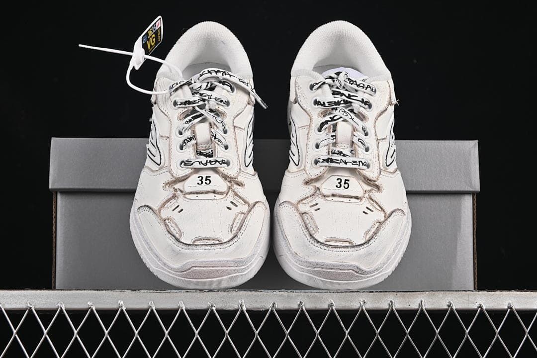 Front view of the pair with patterned laces and size 35 markings