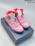 Pair of pink Awake NY x Air Jordan 5 style mid-top sneakers on a shoebox; image overlay shows code 2606HHD891A11 and a size range.