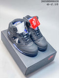 Pair of gray and blue Nike Air Jordan 5 Retro high-top sneakers on a box