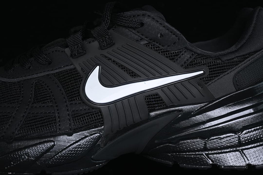 Close-up of the side Swoosh and layered upper
