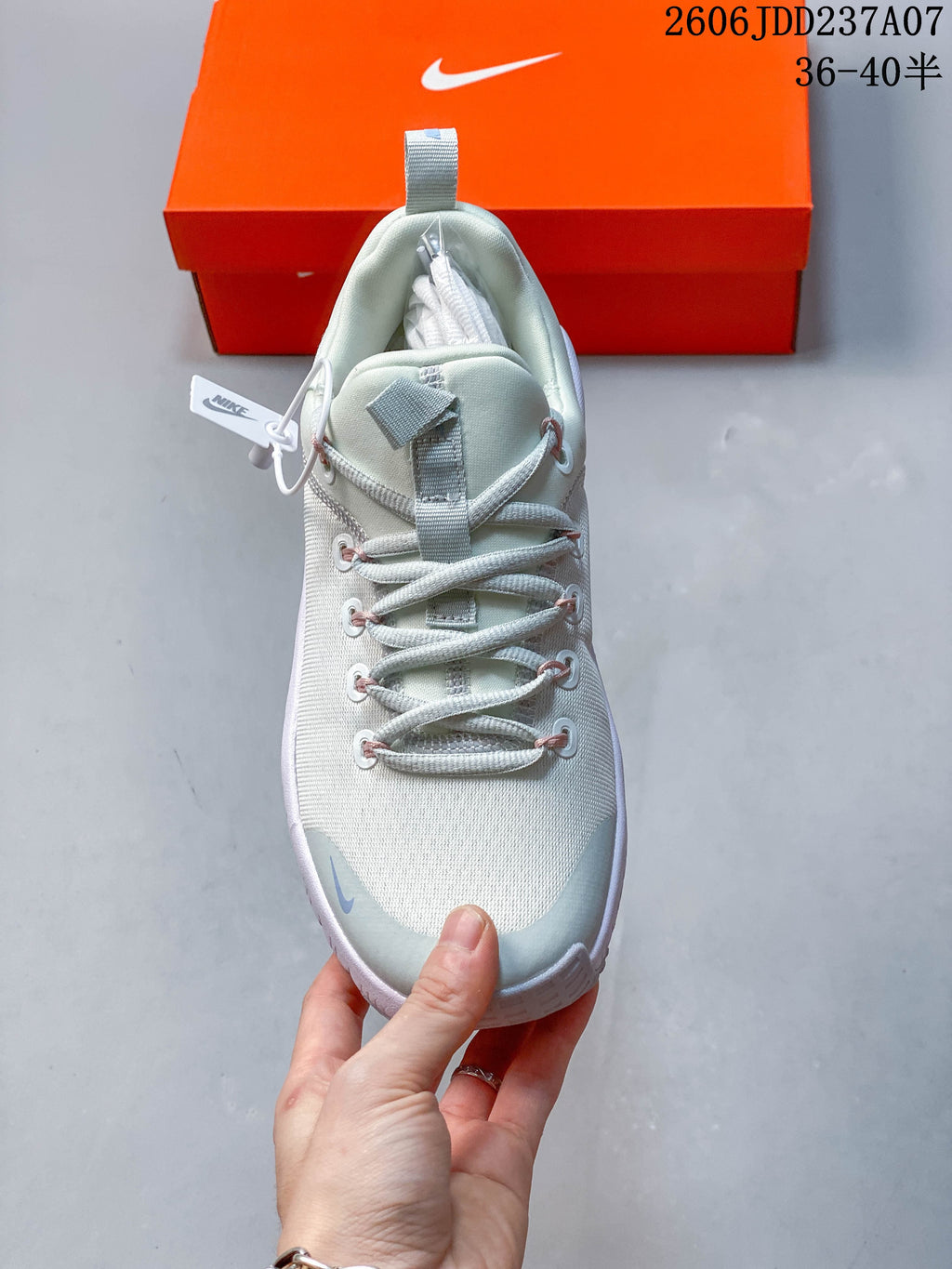 Top view of a pale mint Nike Free Metcon 6 shoe with lace-up closure