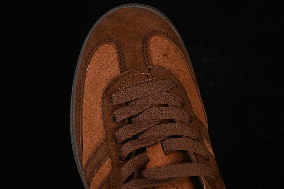 Top-down view of the brown sneaker toe and lace area