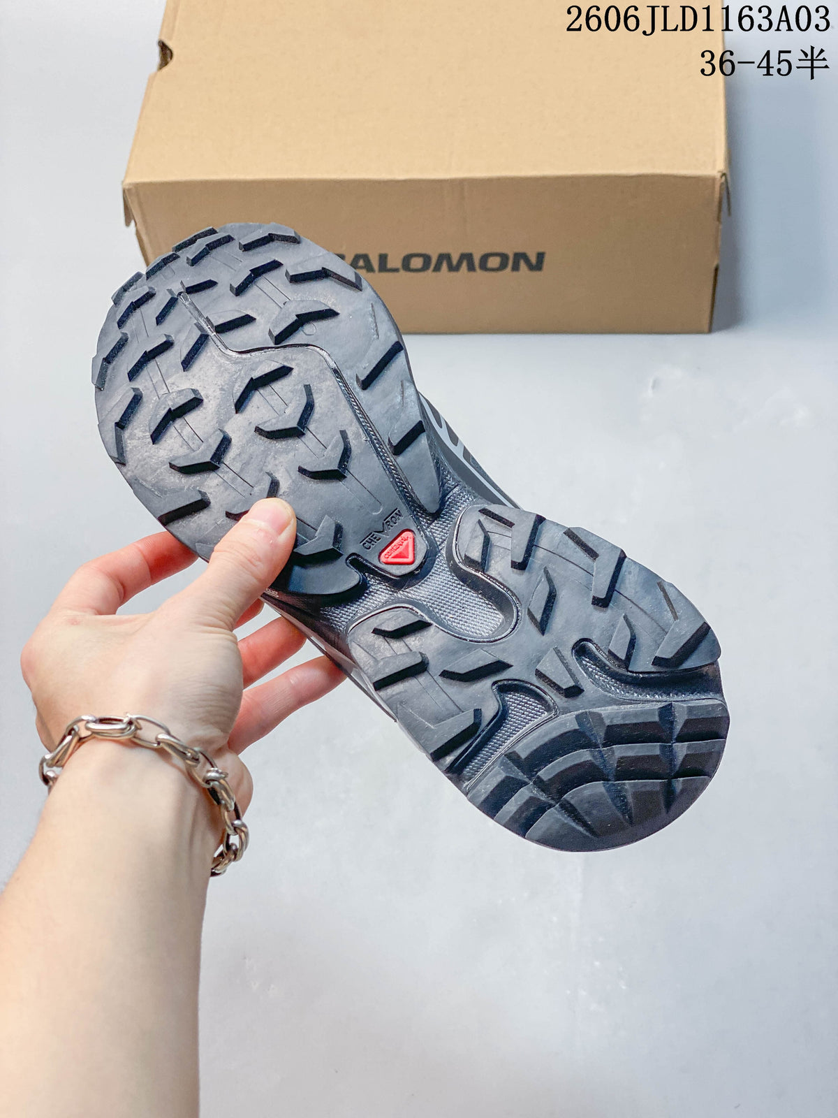 Close-up of the Salomon XT-6 GTX outsole with a prominent lug pattern