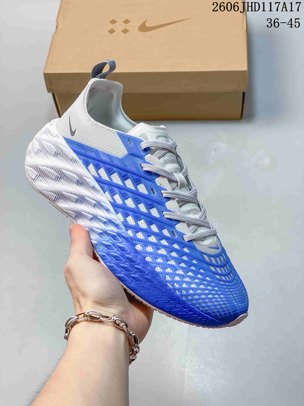 White and blue Nike Ava Rover Hs sneaker