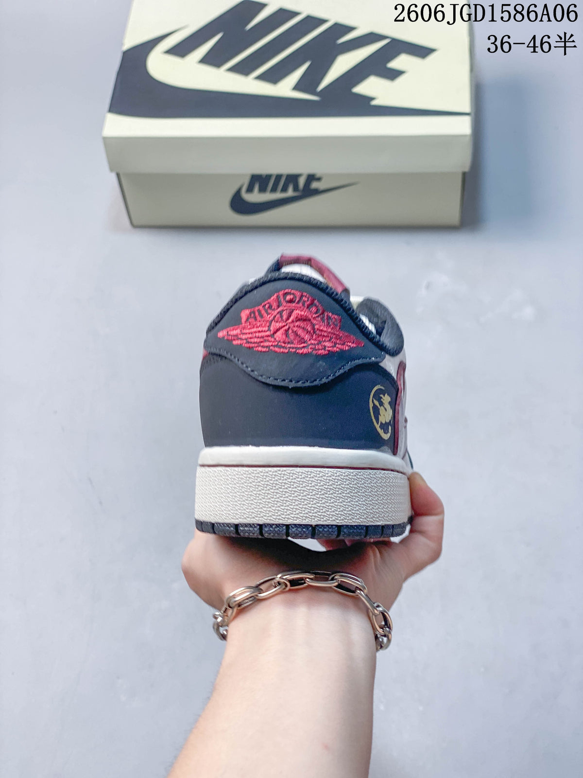 Rear view showing the navy heel, red embroidered detail, and white midsole
