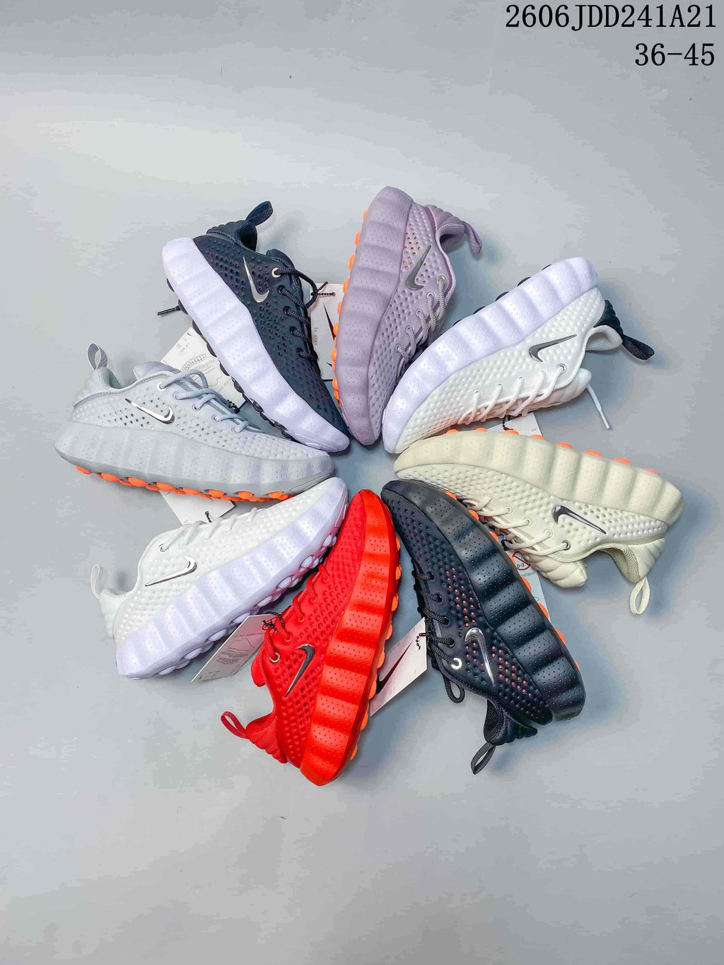 A group of Nike Mind 002 SP FK shoes displayed in several colorways.