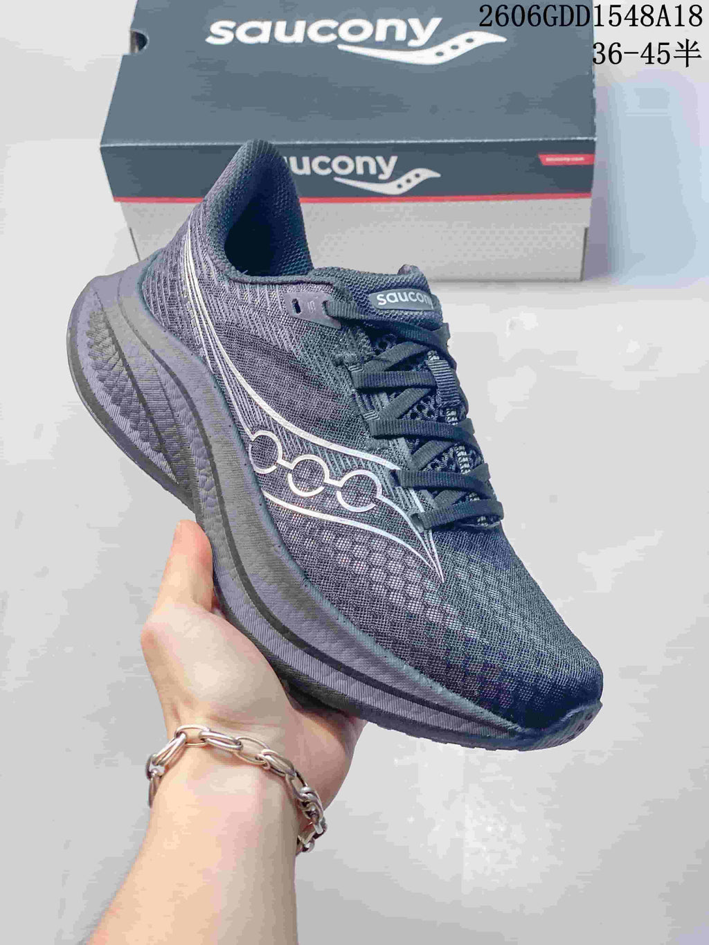 Side profile of the charcoal-gray Saucony Endorphin Speed 5 running shoe