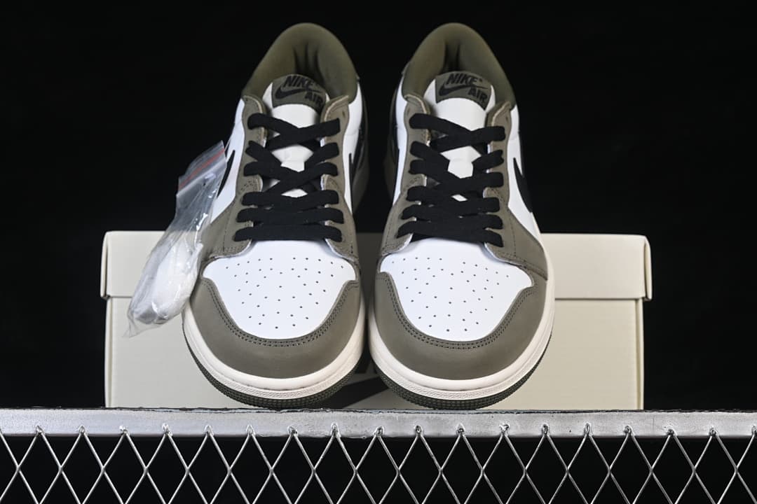 Front view of the pair showing perforated toes and black laces
