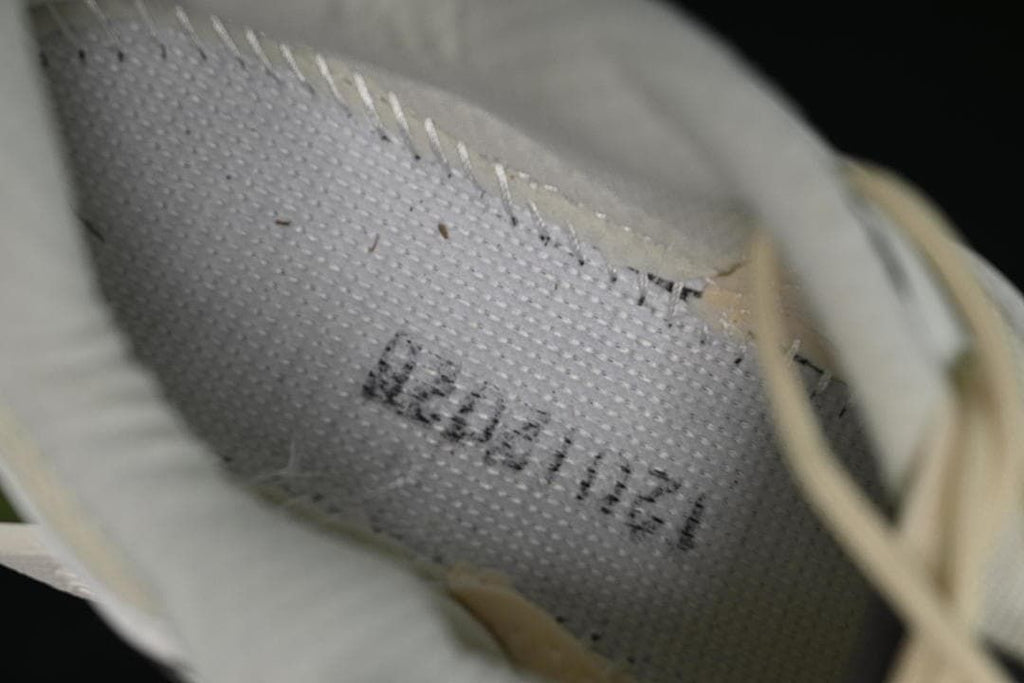 Close-up inside the shoe showing the interior label.