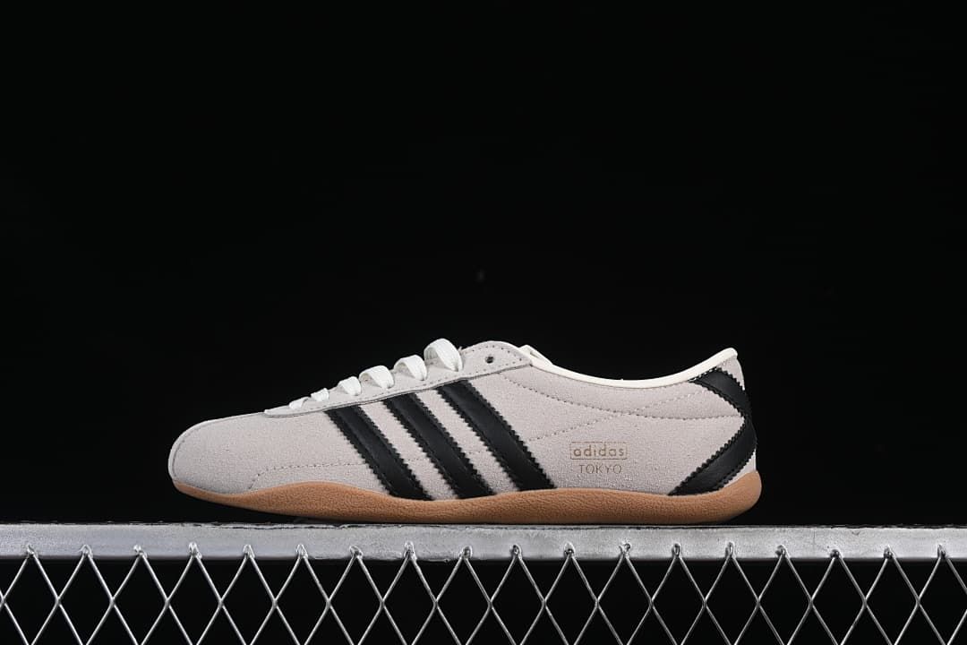Side view of the adidas Tokyo W sneaker in cream, black, and gum colors