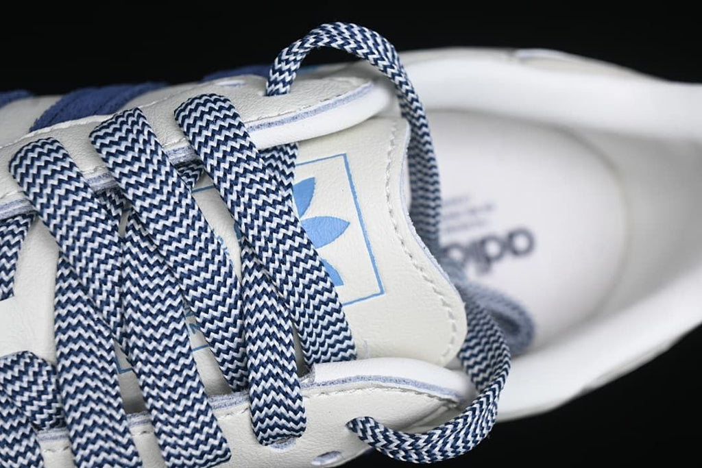 Close-up of the patterned laces and tongue branding.