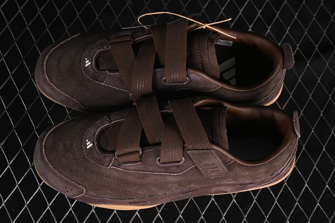 Pair of brown strap sneakers photographed from above.
